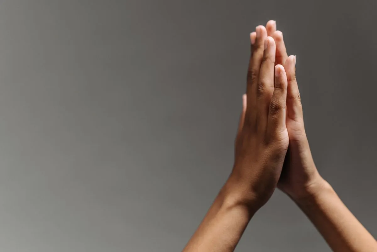 Two hands held together, palms facing upward